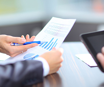 Business team analyzing market research results together